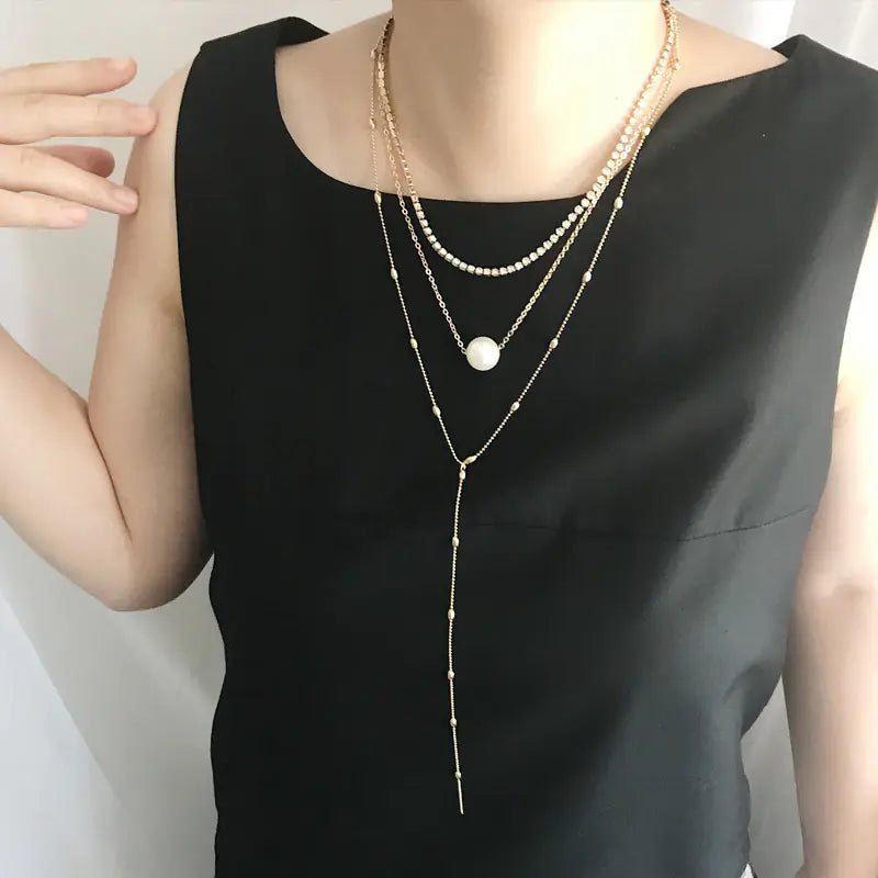 Elegant Pearl Layered Necklace with Crystal Pendant