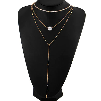 Elegant Pearl Layered Necklace with Crystal Pendant