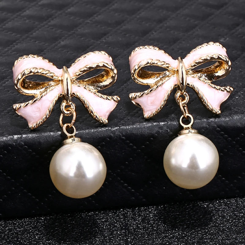 Pearl Bowknot Drop Earrings – Pink Accent
