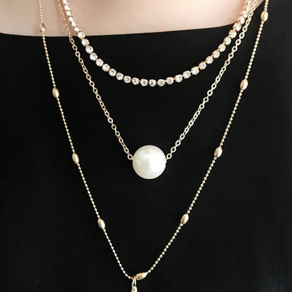 Elegant Pearl Layered Necklace with Crystal Pendant