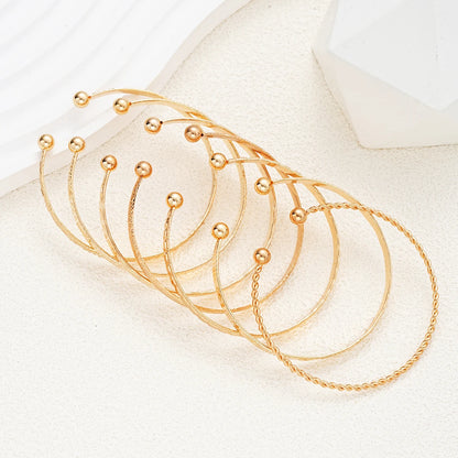 7-Piece Gold Punk Bracelet Set for Women – Streetwear Edge