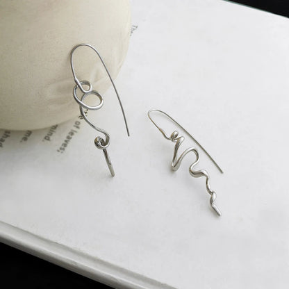 Sculpted Retro Statement Earrings – 3D Design