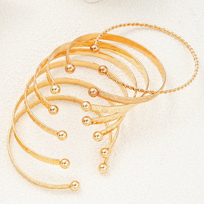 7-Piece Gold Punk Bracelet Set for Women – Streetwear Edge