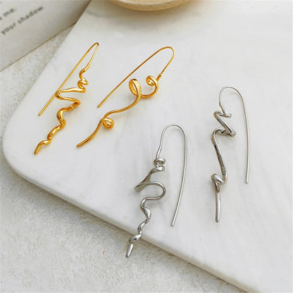 Sculpted Retro Statement Earrings – 3D Design