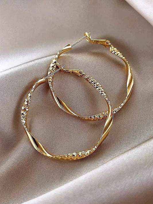 Exquisite Twisted Gold Hoop Earrings – Timeless Silky Texture Design