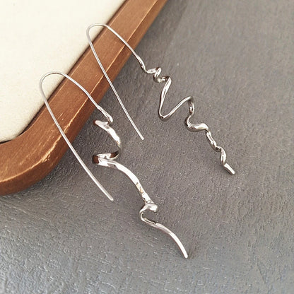 Sculpted Retro Statement Earrings – 3D Design